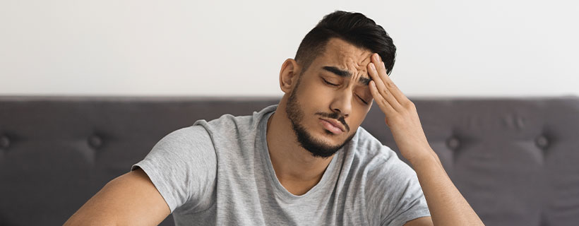 Patient suffering from Headache in need of chiropractor in San Francisco